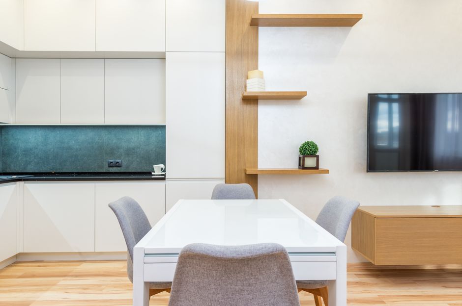 Modern wood custom dining table in a well-lit room